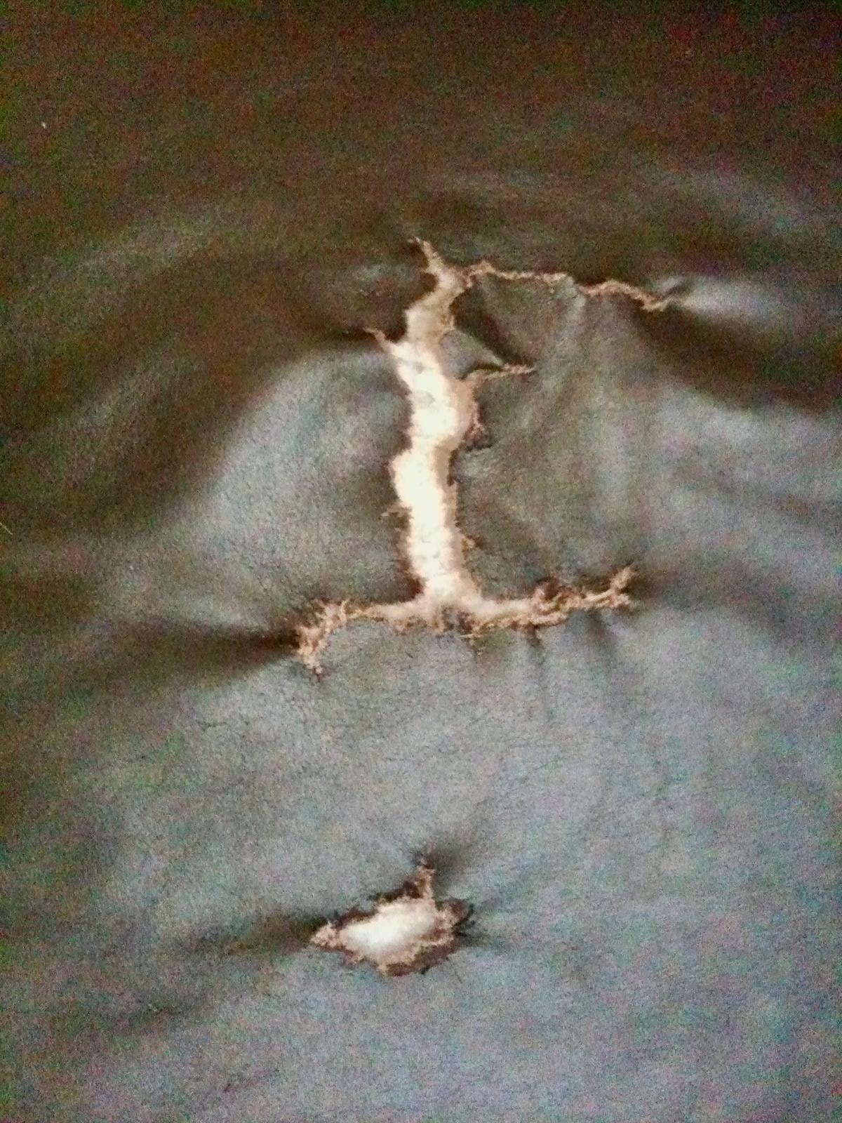 Leather Tear & Damage Repair — before repair
